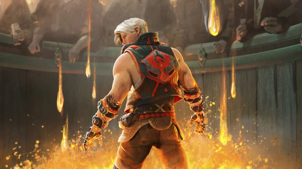 A man in an arena is surrounded by fire.