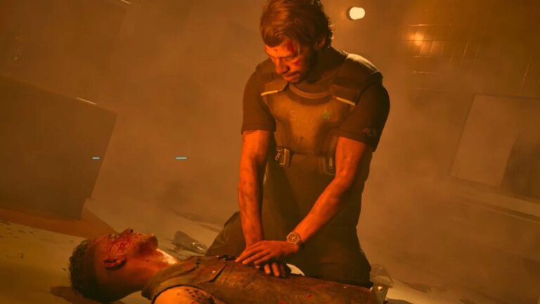 A man performs CPR on someone.