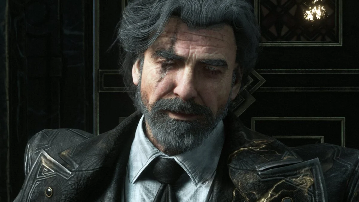 A man with a beard looks tired.